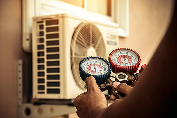 Professional Heat Pump Repair technician working in Eastham, MA